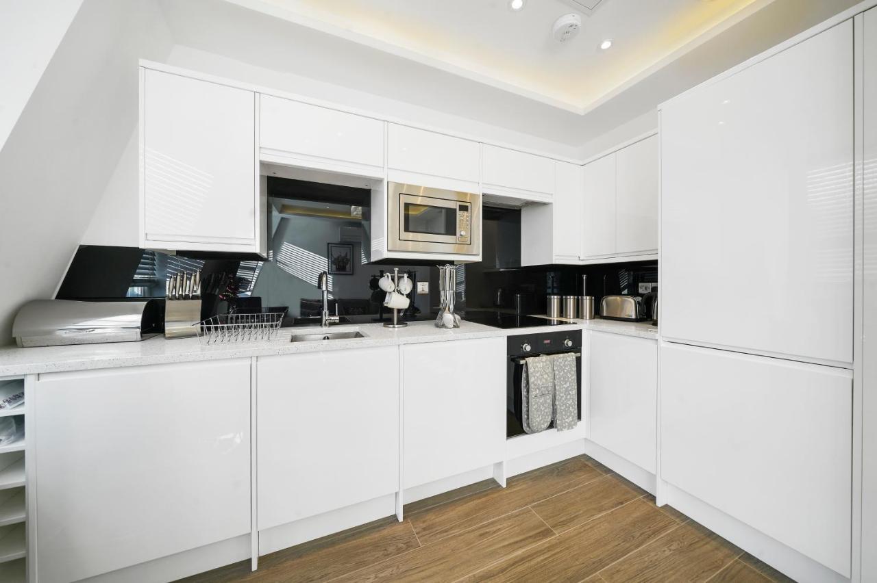 City Prime Apartments London Exteriör bild A modern kitchen