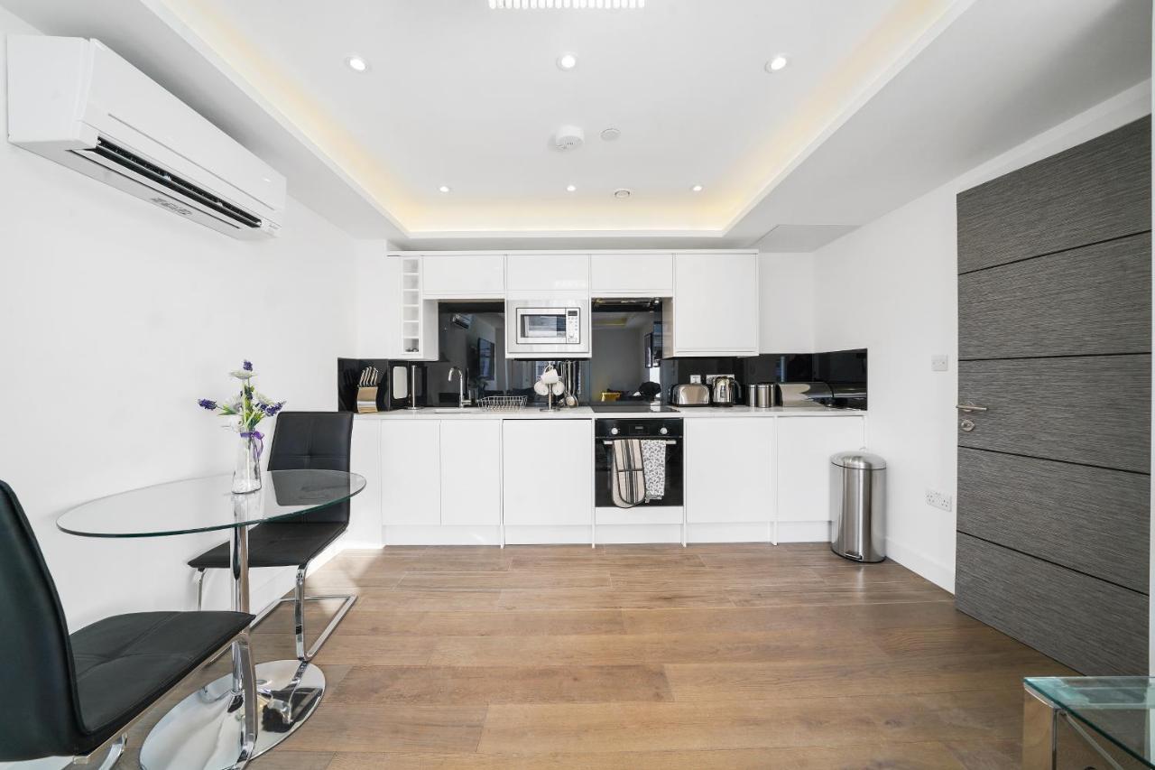 City Prime Apartments London Exteriör bild A kitchen in a serviced apartment in London